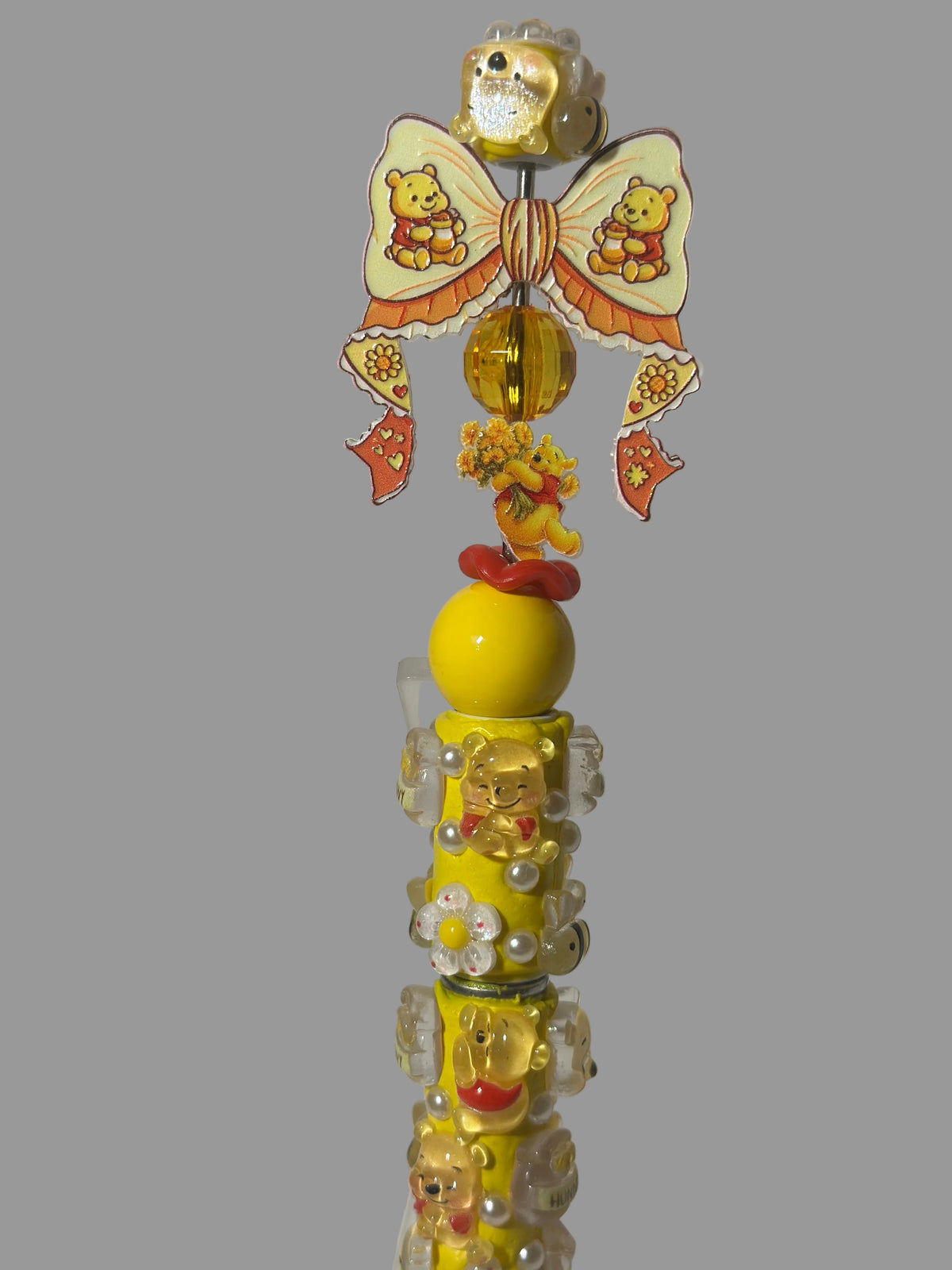 Winnie the Pooh Themed pens & Wristlets