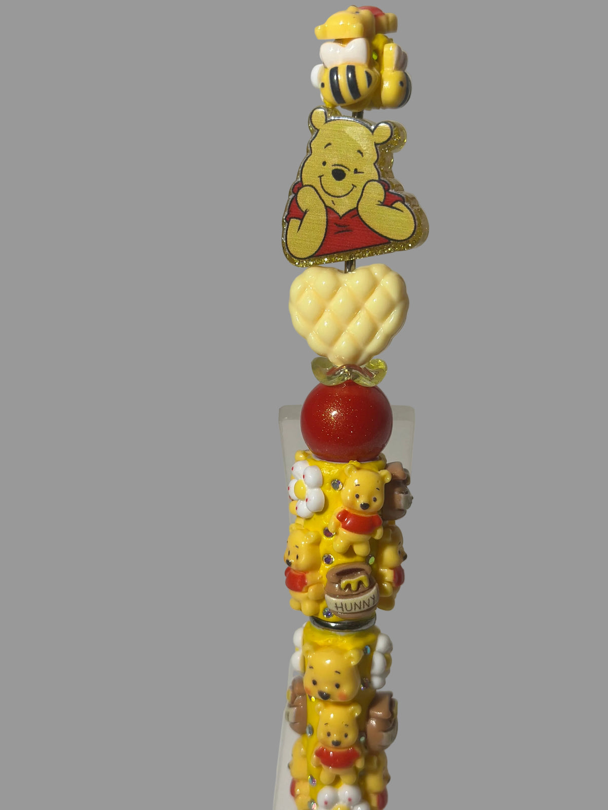 Winnie the Pooh Themed pens & Wristlets