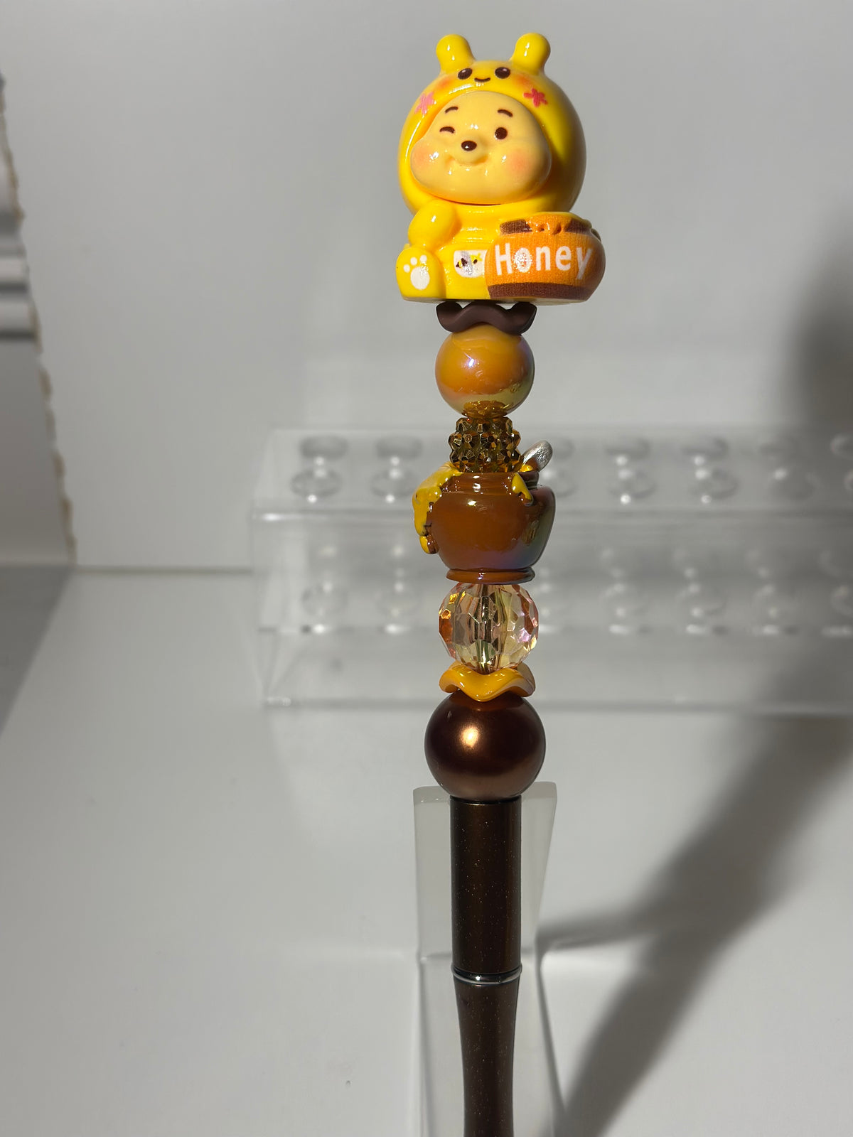 Winnie the Pooh Themed pens & Wristlets